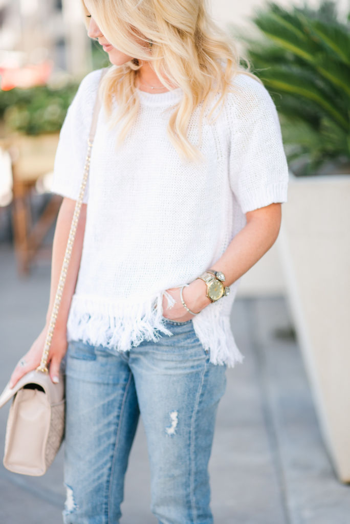 wearing a sweater in the summer